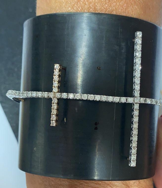 The cuff with the rows of diamonds, worn